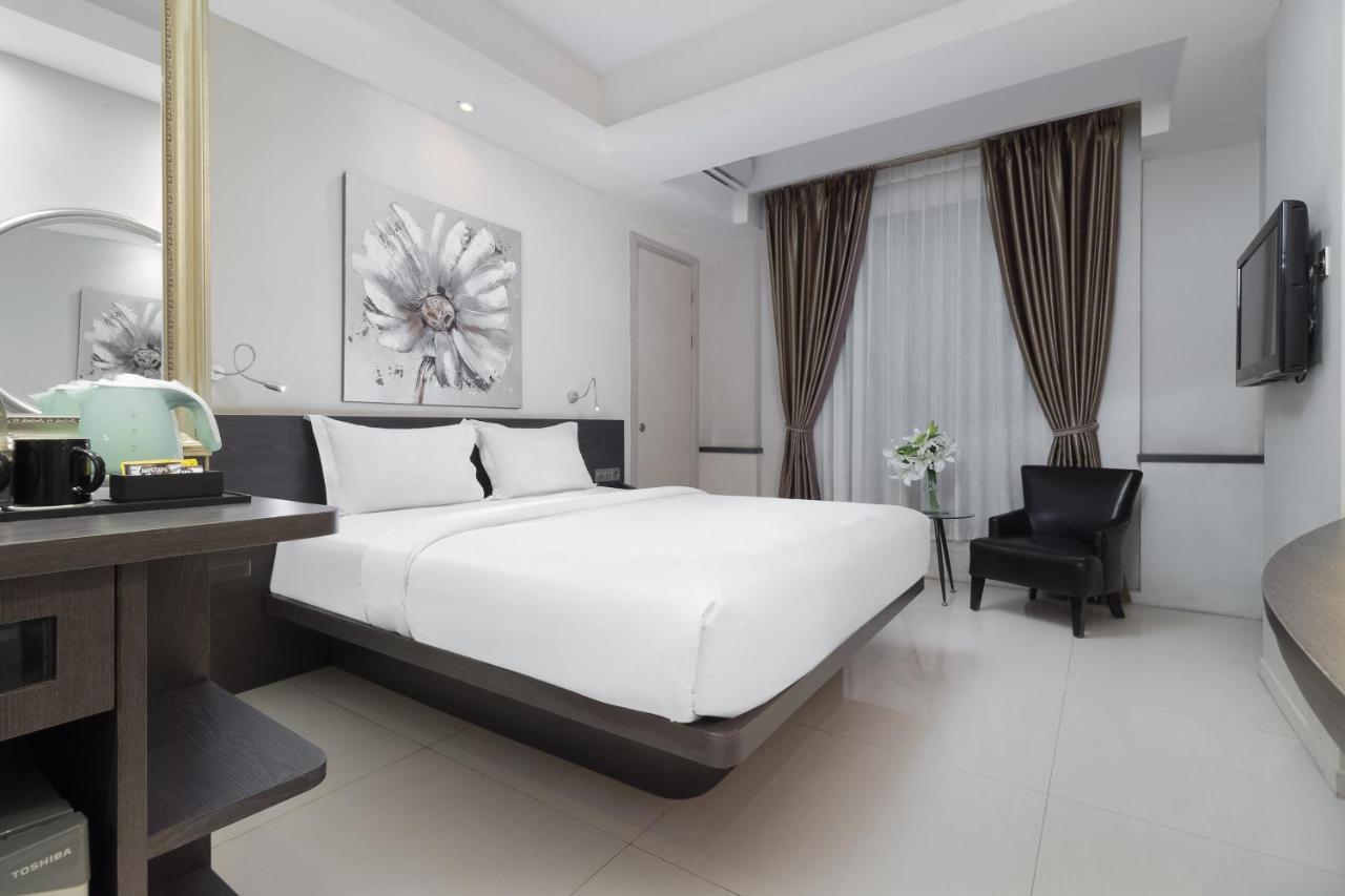 Sun Boutique Hotel Кута Экстерьер фото
